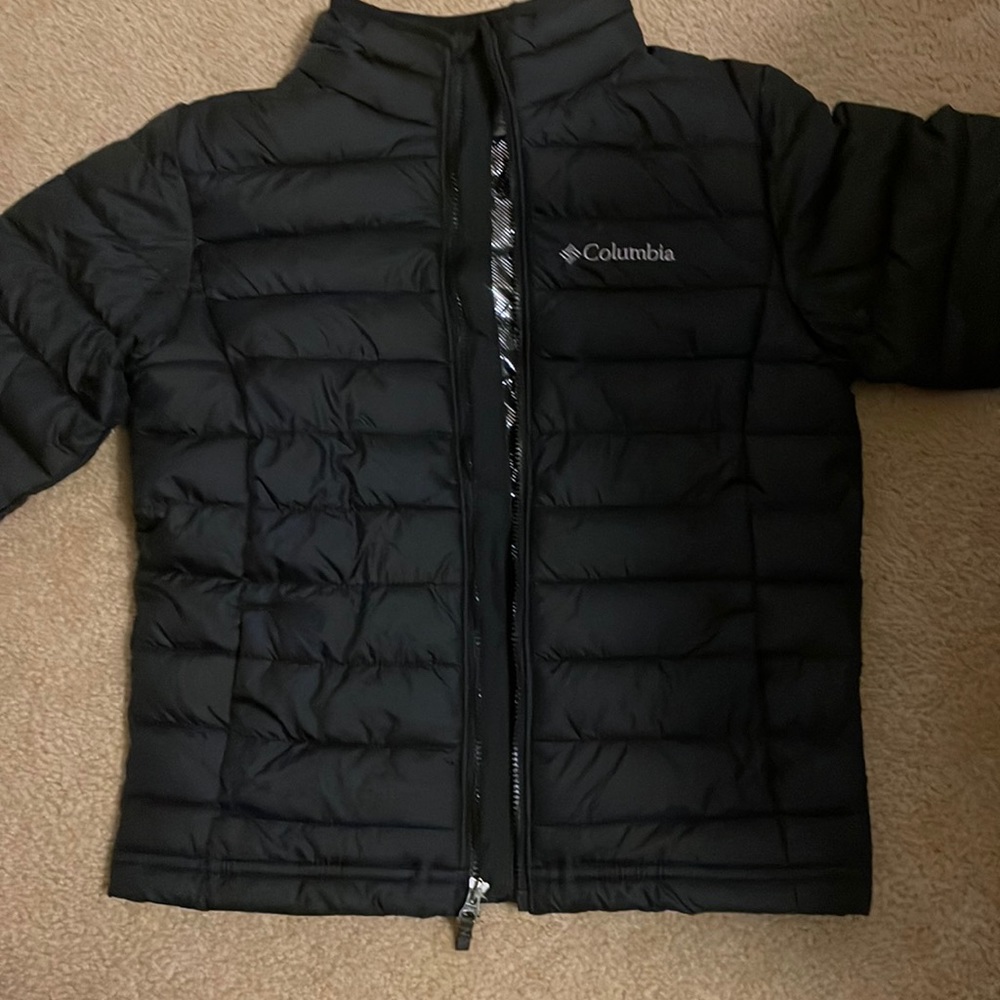 Black Columbia youth coat. Brand new with tags size xs (6/7)
